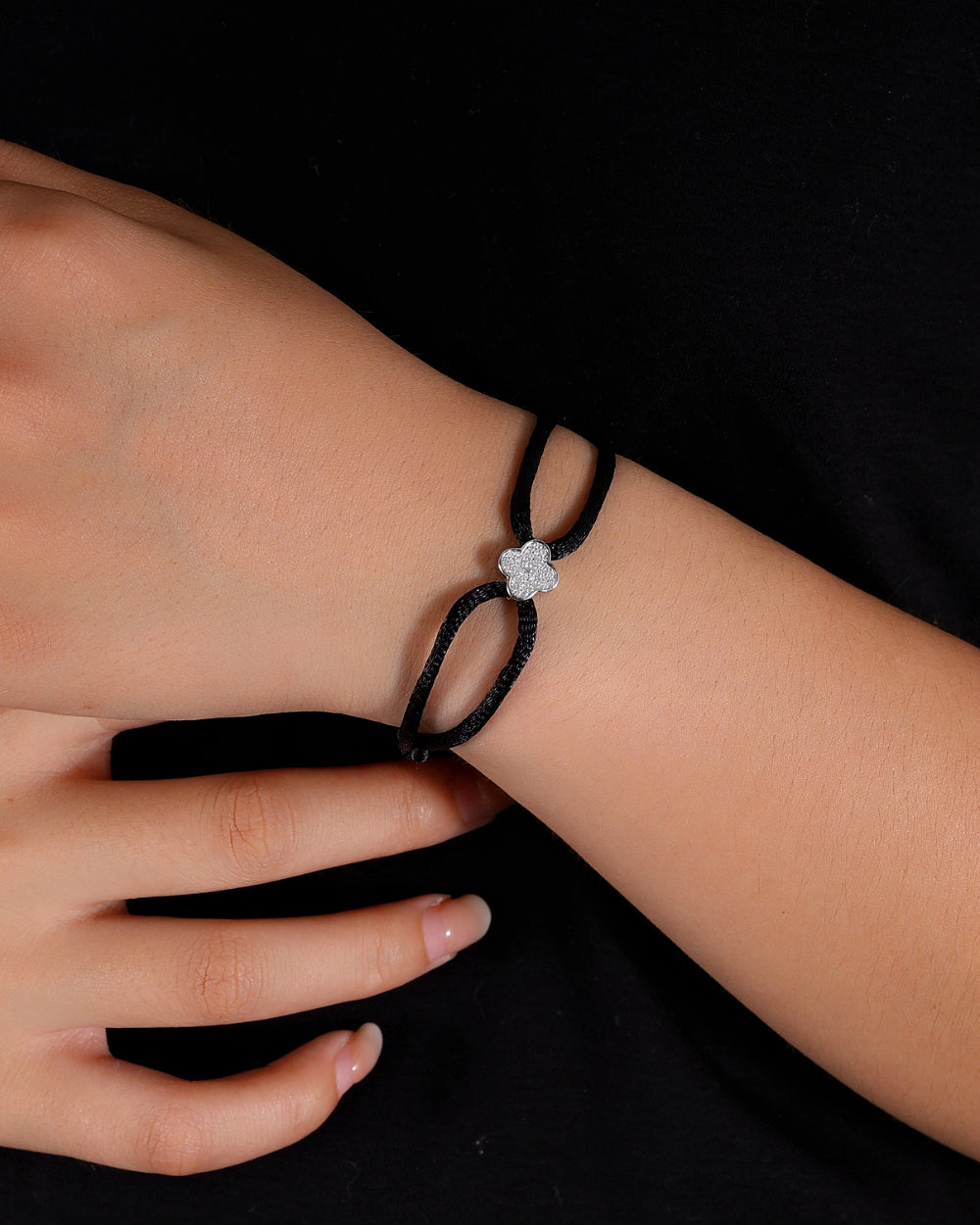 MOISSANITE ICED CLOVER CORD BRACELET.